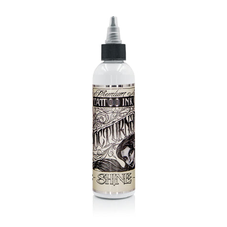 Nocturnal Shine White Legacy — زجاجة على خلفية بيضاء, مثال على عبوة عائلة المنتج