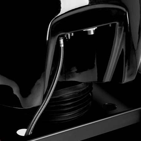 Omega Nautica black hairdressing wash unit with sink, chair, and professional styling station for salon use.