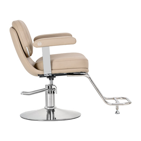 Omega Astra beige hairdressing chair with padded seat and backrest, adjustable height, and sturdy metal base.