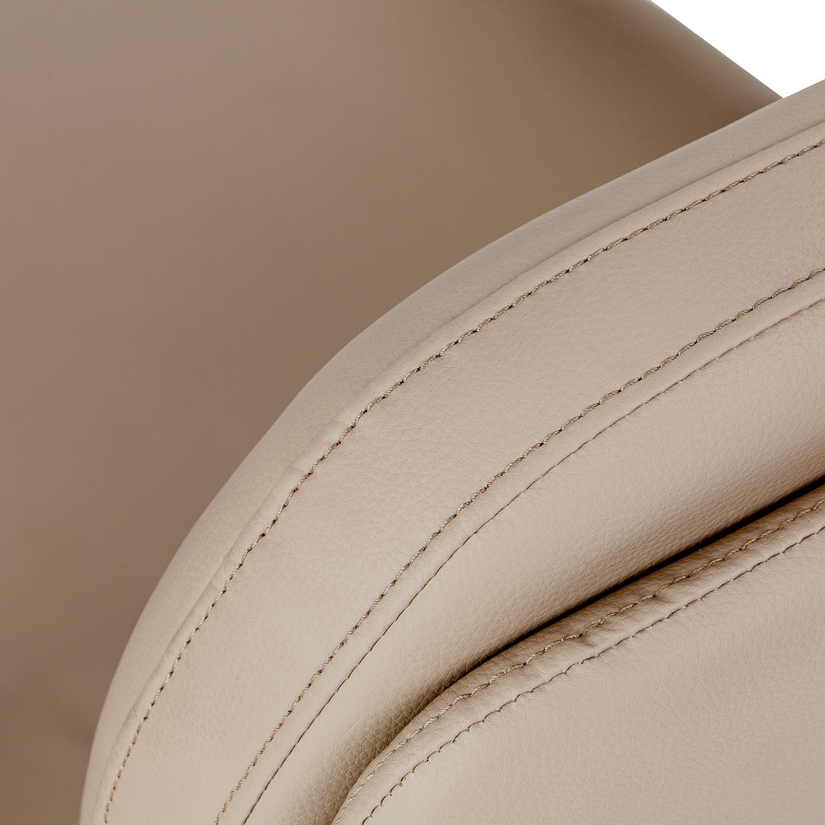 Omega Astra beige hairdressing chair with adjustable headrest and armrests, featuring a sleek, modern design for salon styling.