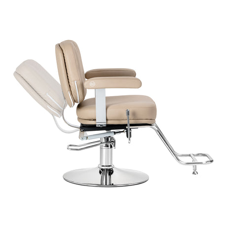 Omega Astra Plus beige hairdressing chair with adjustable headrest and armrests, featuring a cushioned seat and backrest.