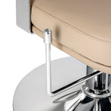 Omega Astra Plus beige hairdressing chair with adjustable height and cushioned seat for salon styling and client comfort.