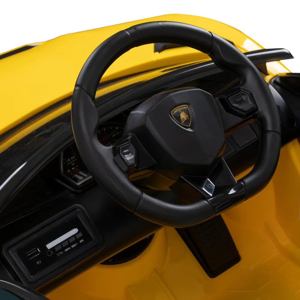 Yellow kids salon chair with steering wheel and seatbelts