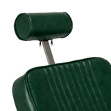 Green Gabbiano Royal X barber chair with padded armrests and adjustable headrest, designed for professional barbershop use.