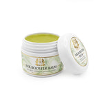 Skin Monarch Ink Booster Balm 30مل, عبوة مفتوحة تحتوي على بلسم أصفر وبجانبها الغطاء