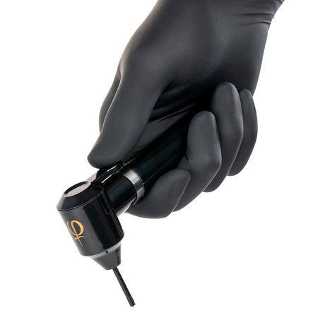 PhiAcademy Phi Mixer Pigment Mixing Tool — pigment mixer held in a gloved hand